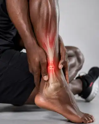 Achilles Tendon Rupture and Heel Pain in Athlete Stock Photo