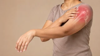 Woman Experiencing Frozen Shoulder Pain with Anatomical Joint Overlay
