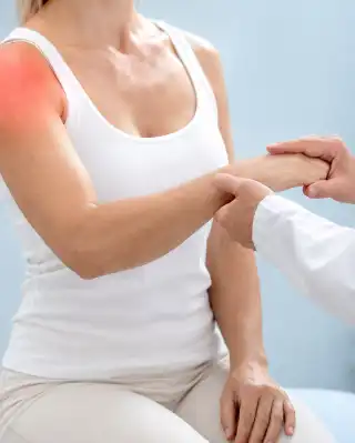 Rotator Cuff Weakness Test Being Performed by Orthopedic Doctor