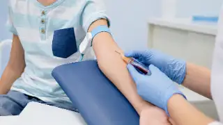 Pediatric Patient Undergoing Blood Collection in Medical Clinic Stock Photo